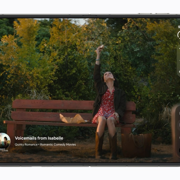 Apple iPhone Duo open, playing video on the 7.6-inch inner display, official Apple product image