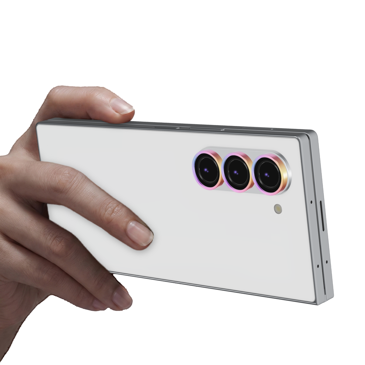 Colourful aluminium camera lens protector rings fitted on every Galaxy Z Fold 6 camera lens, with the phone held in hand